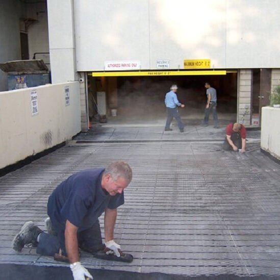 Installing a snow melting system on a parking garage ramp